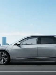 Electric vehicle driving on a road, symbolizing new EPA emissions standards