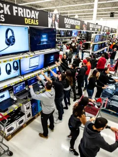 Shoppers eagerly participating in Black Friday sales at a U.S. retail store.