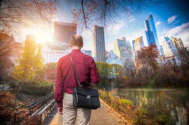 A traveler standing at a vibrant city junction, looking upwards at towering skyscrapers and historical buildings, embodying the exploration of diverse urban landscapes during a stopover.