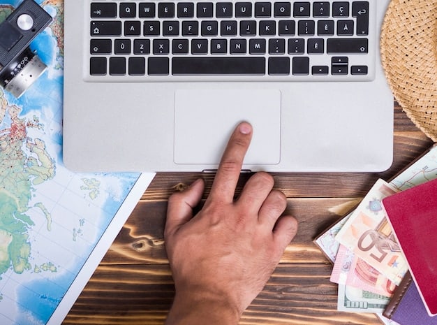 A close-up of a student's hand holding a travel rewards credit card next to a laptop displaying flight booking options, symbolizing smart financial planning for travel.