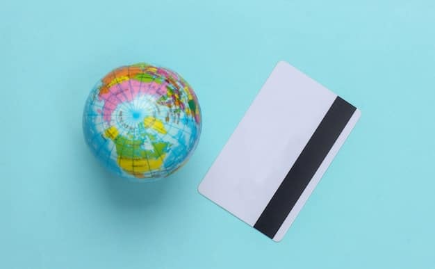 A detailed close-up of a credit card showcasing its intricate design elements and a globe icon, emphasizing its role in international travel and rewards.