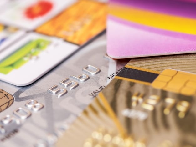 A close-up of different credit cards with blur in the background, showcasing various card designs and financial symbols.