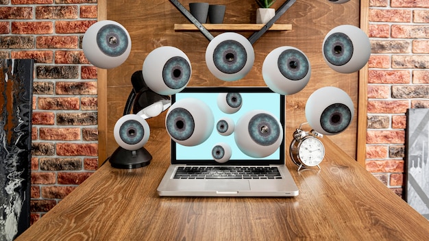 A chaotic home office setup with multiple devices (laptop, smart speaker, security camera), some with warning icons, depicting the vulnerabilities of remote work and IoT devices. There's a blurred background of a living room.
