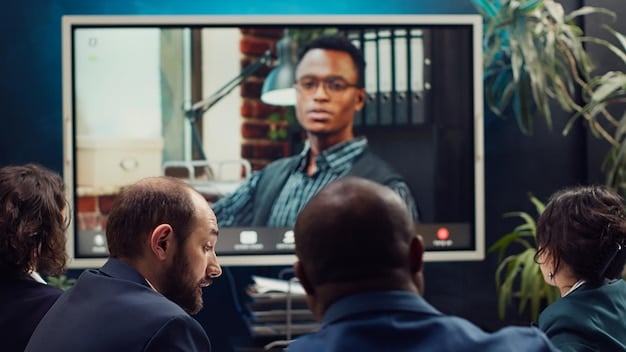 A professor lecturing to a virtual classroom on a large screen, with various student faces in smaller video windows, emphasizing interactive online learning.