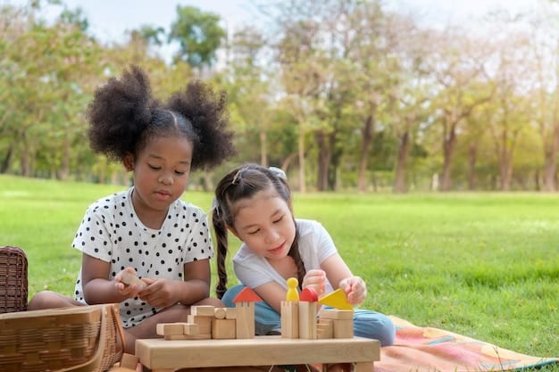 Two children of different ethnic backgrounds are happily building a tall tower with colorful wooden blocks on a rug, symbolizing cooperative play and diverse learning environments.
