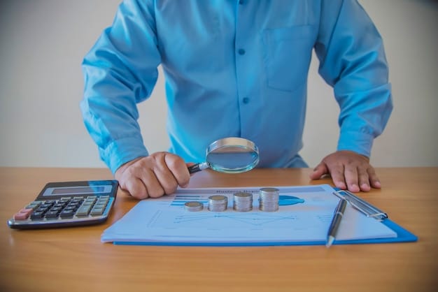 A person holding a magnifying glass over a financial document with numbers and charts, emphasizing careful financial planning and analysis.